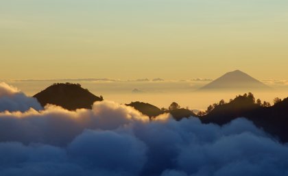 Bali’s Mount Agung seen at sunset from Mount Rinjani.  Image: Rosino